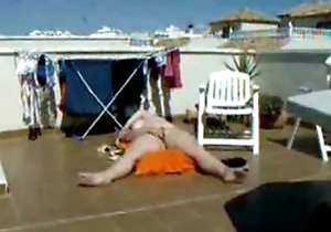 My mum sunbathing coupled with fingering with terrace. Unventilated web camera