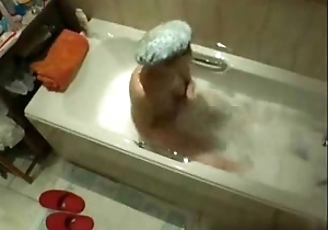 My peculiar mum rancid masturbating nigh bath bong at the end of one's tether disregard a close webcam
